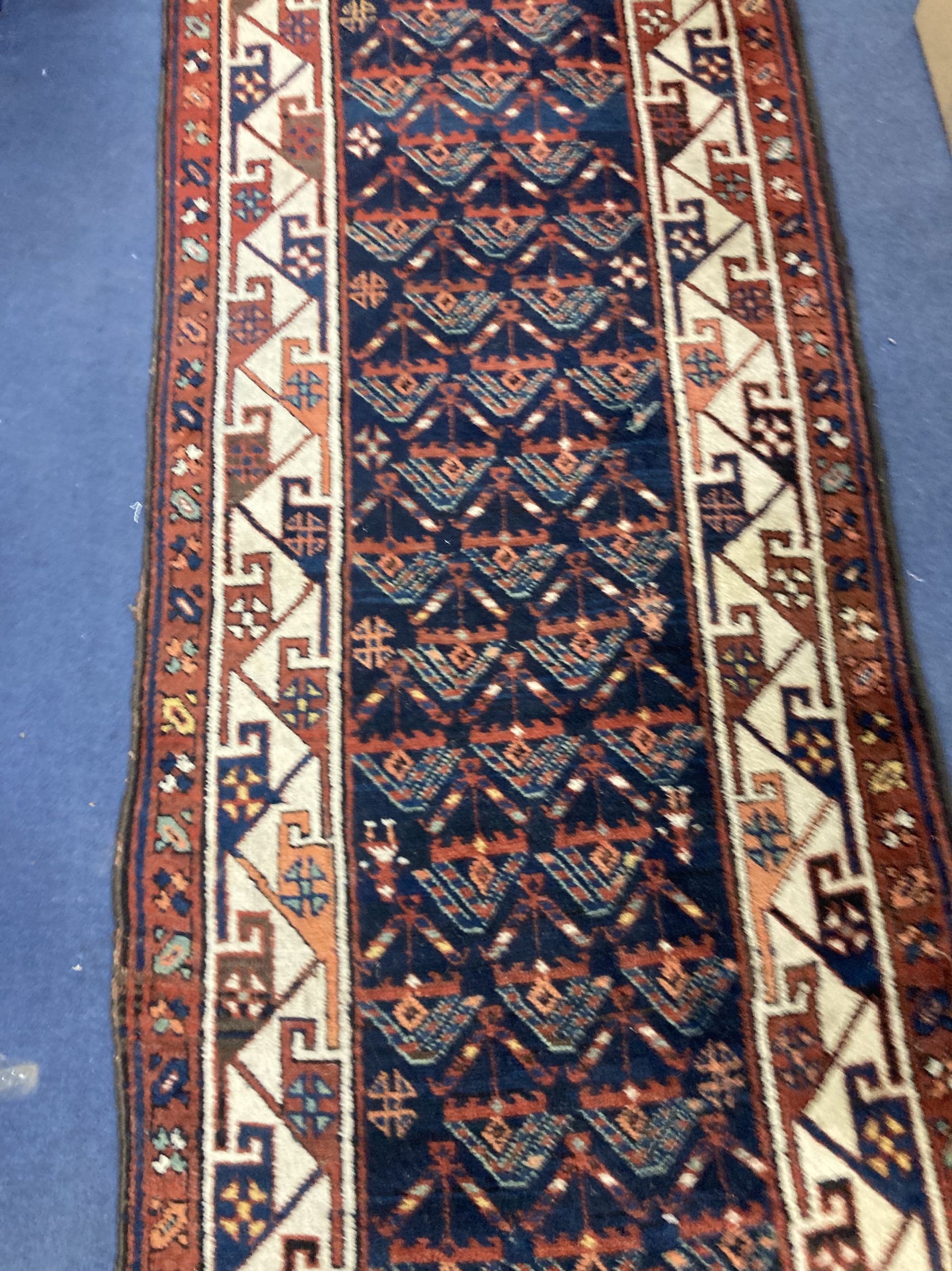 A Caucasian geometric pattern runner, 366 x 90cm